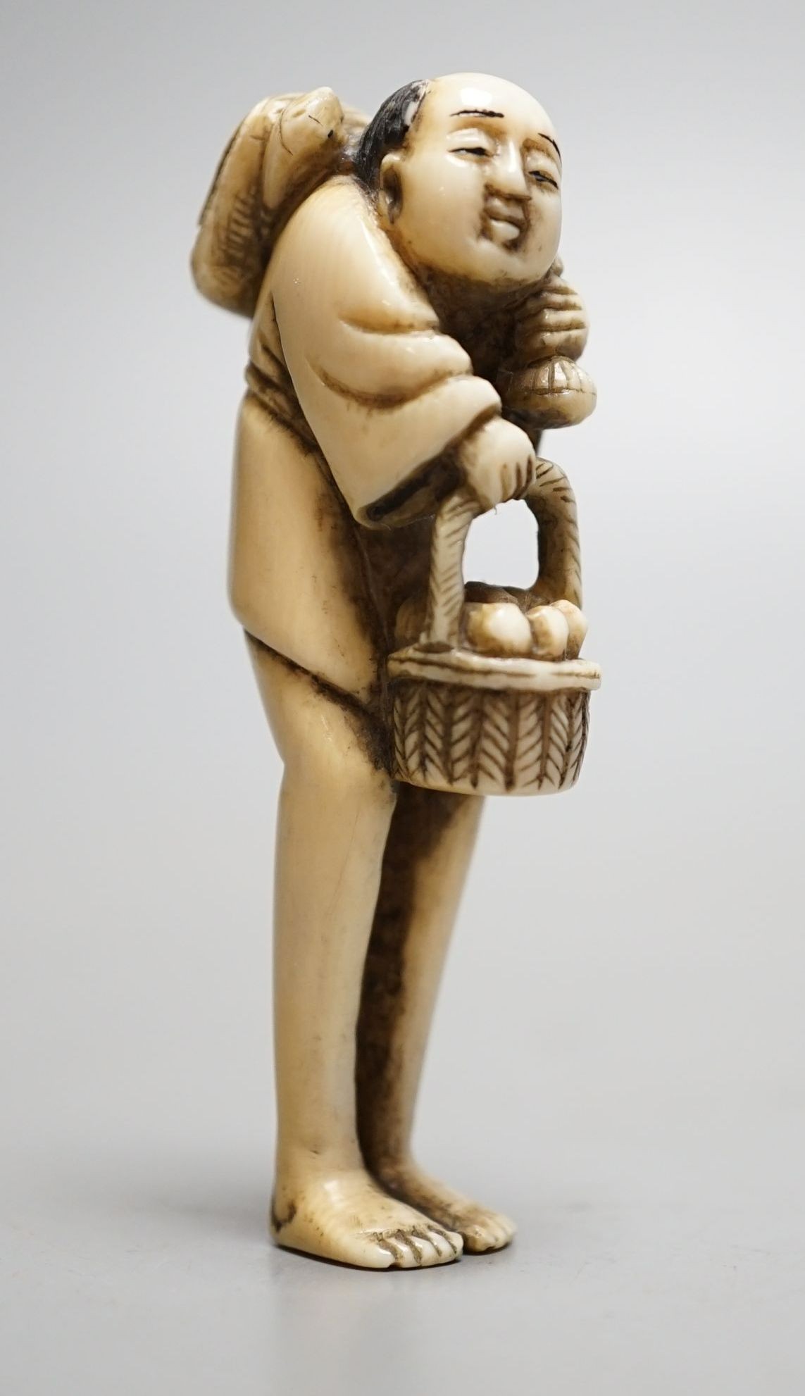 A Japanese ivory netsuke of Tenaga, 19th century, 7 cms high